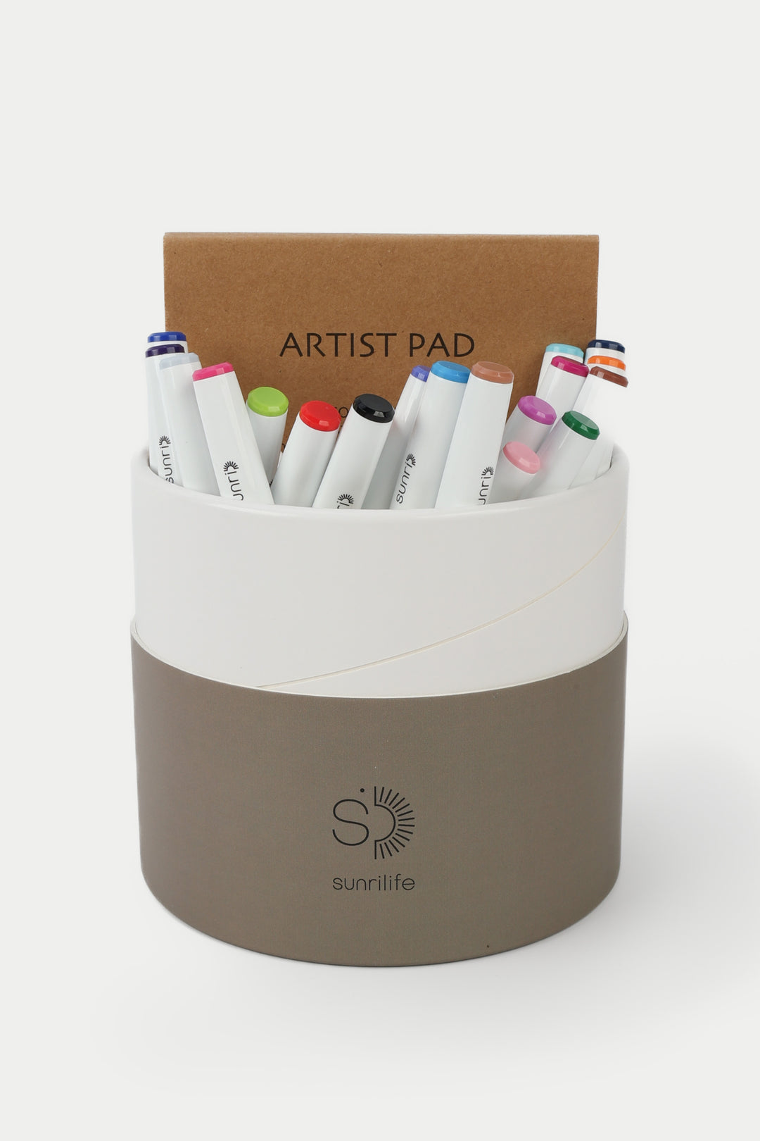 Open recycled cardboard brown tube showing 24 felt-tip pens and an artist pad
