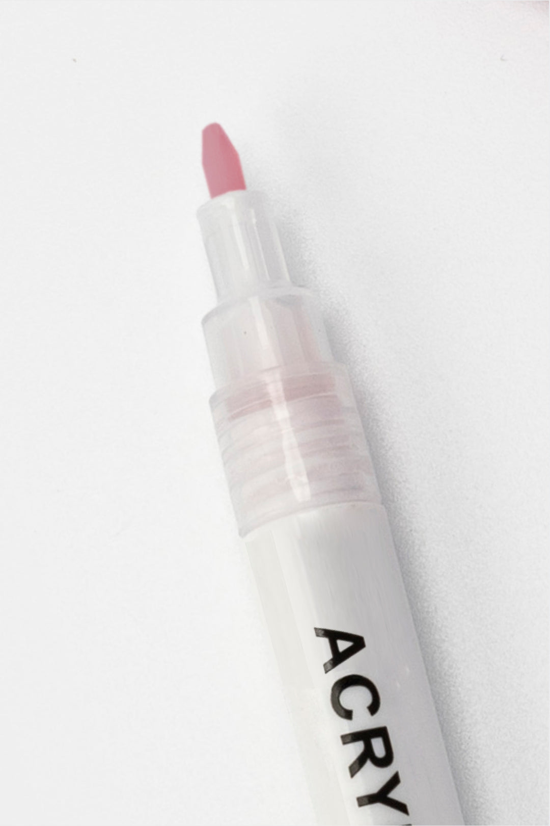 close-up of pink premium acrylic marker with exposed 1mm tip
