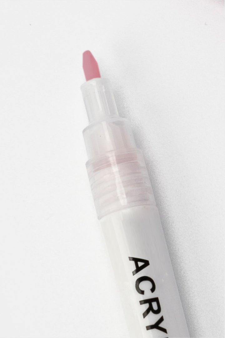 close-up of pink premium acrylic marker with exposed 1mm tip