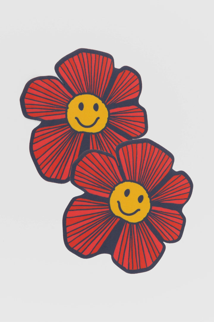 pair of screen wipes in flower shape shown on a white background
