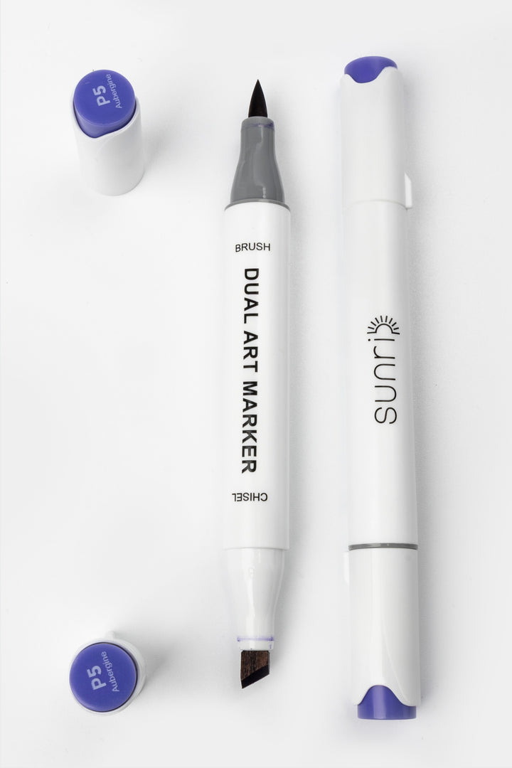 Dual tip art marker displayed open with brush tip on one side and chisel tip on the other, white barrel with Sunri logo
