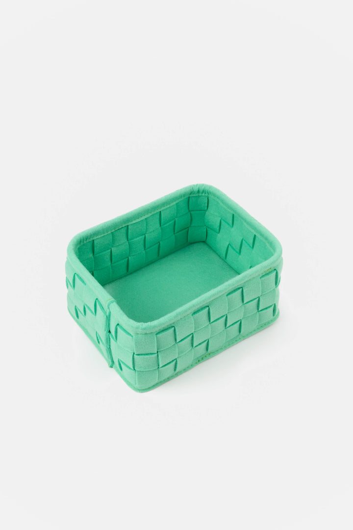 small woven felt storage box shown from above with its structured woven felt sides and soft interior
