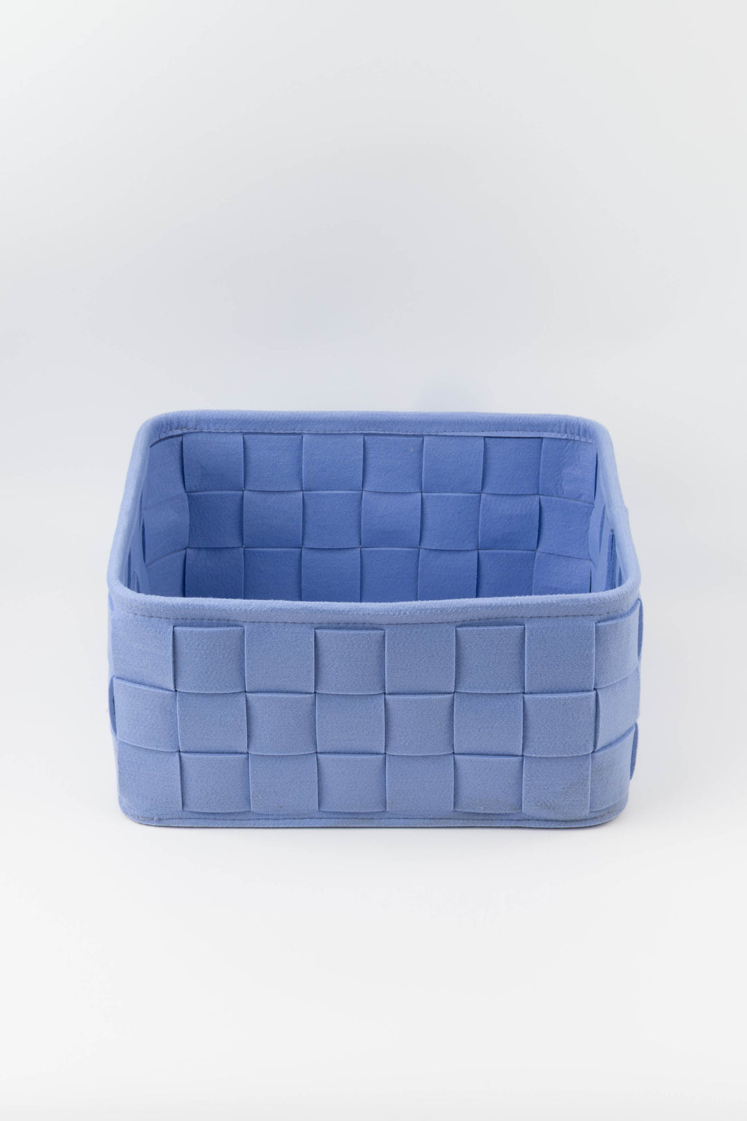 medium woven felt storage box shown from above with its structured woven felt sides and soft interior
