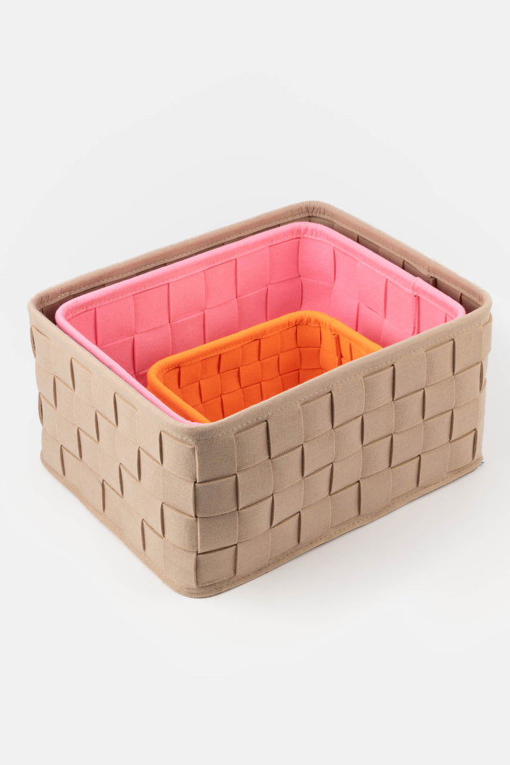 three woven felt storage boxes nested together in different sizes

