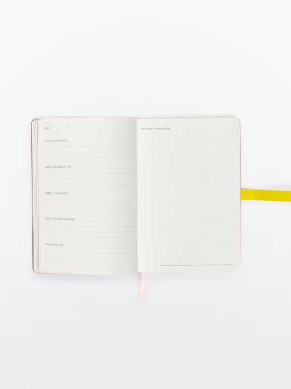 Calendar planner with a yellow ribbon on a white background