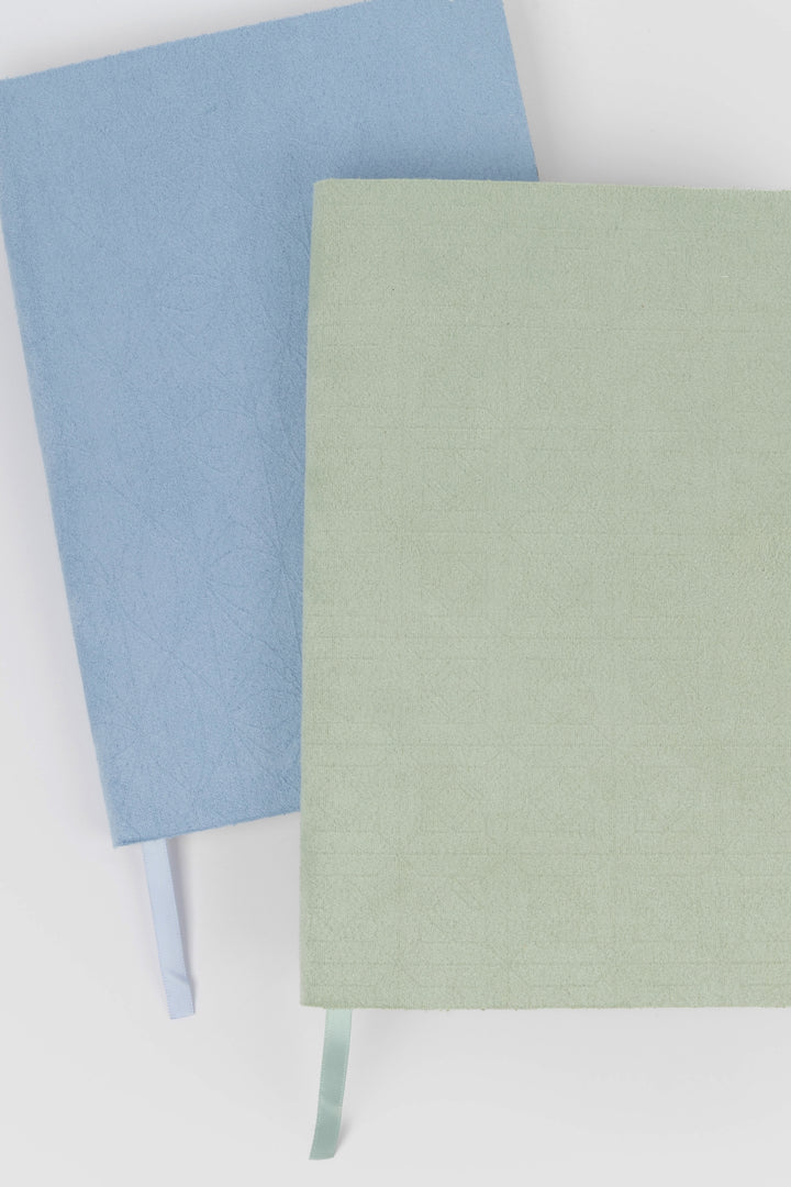 green and blue faux suede  flex-cover diaries with embossed patterns