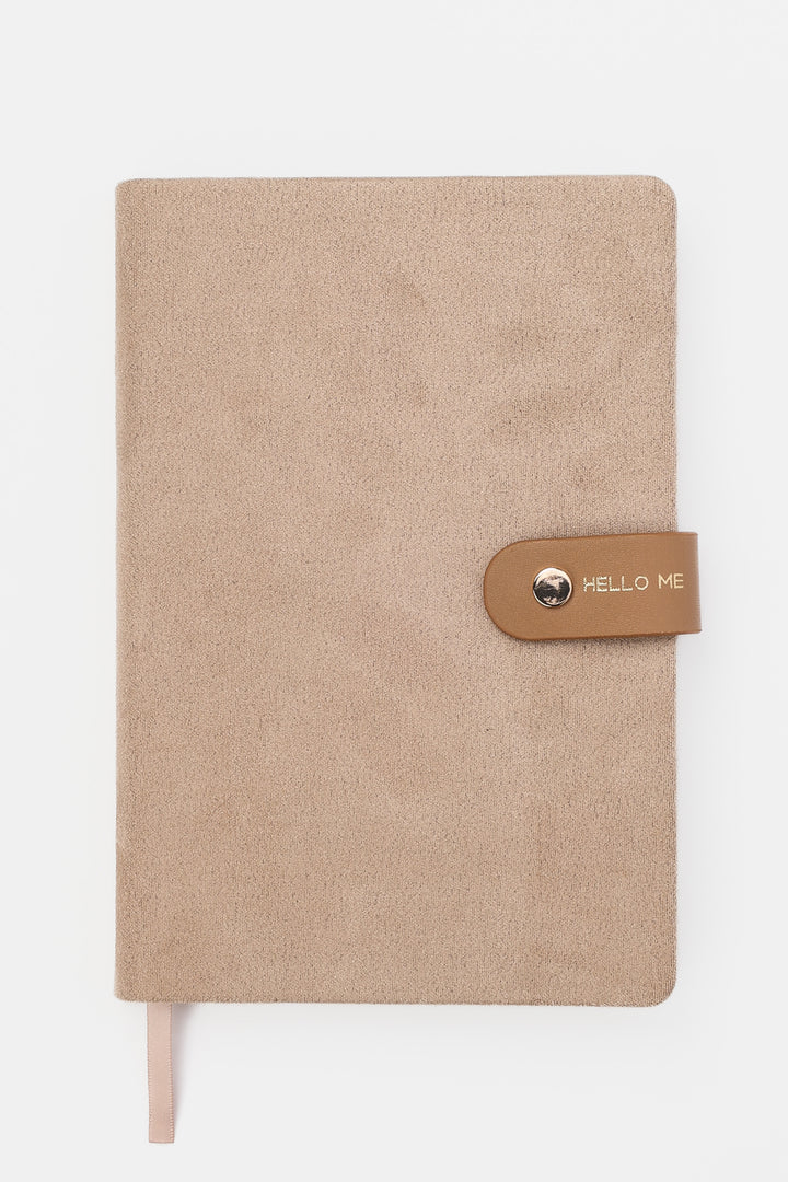 front view of brown a faux-suede notebook with a rounded flap closure with gold button detail and hello me text