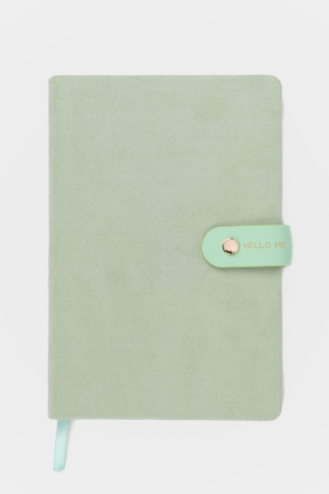 front view of a mint faux-suede notebook with a rounded flap closure with gold button detail and hello me text