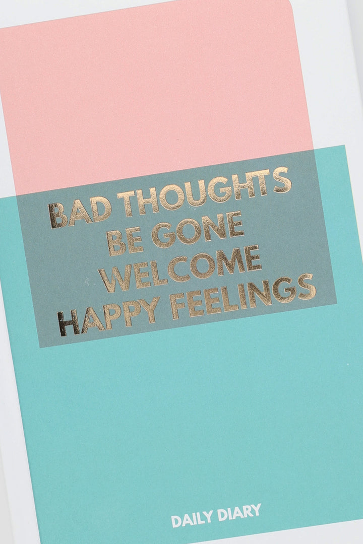 pink and teal colour-block hardcover diary with gold-foil text
