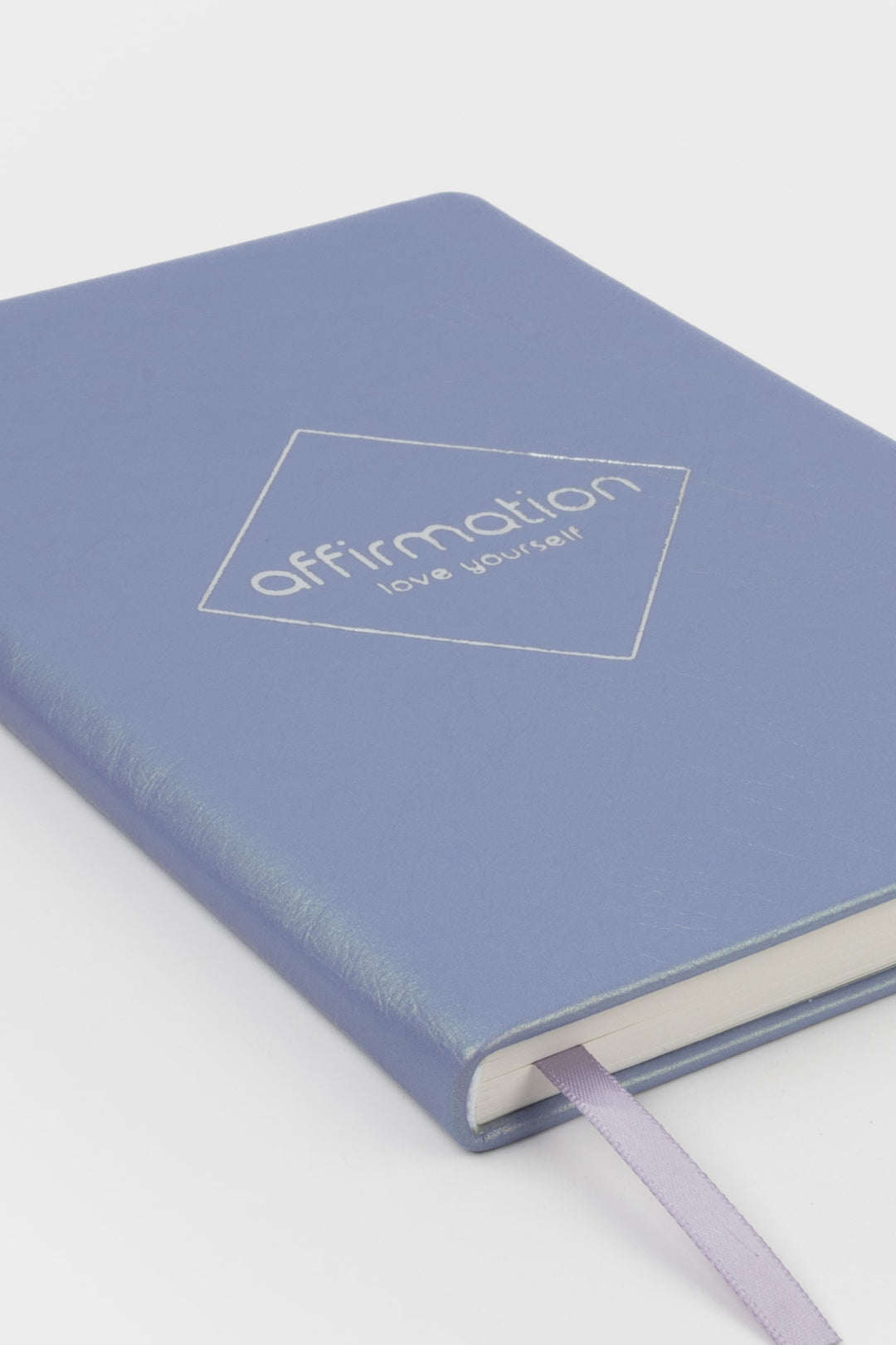 Lavender purple notebook with 'affirmation' branding 