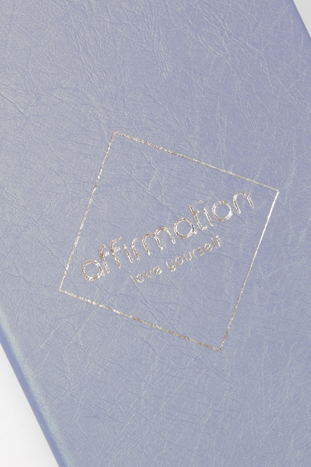 Lavender purple notebook with 'affirmation' embossed text 