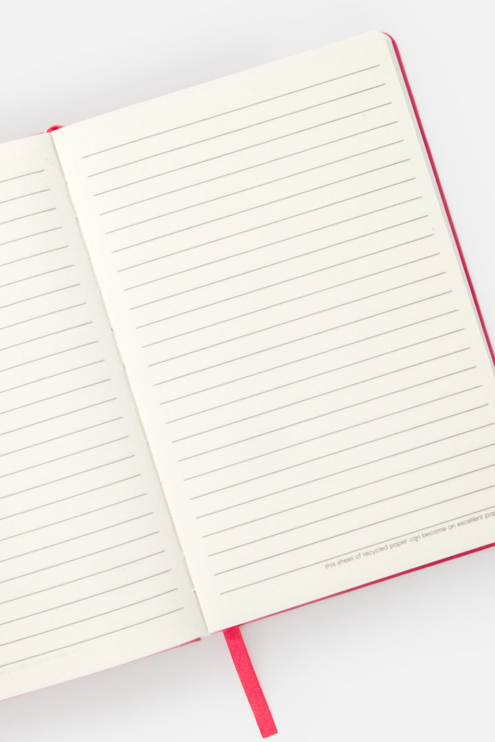 open A5 notebook with ruled pages and  satin marker visible

