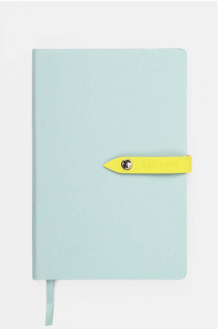 mint coloured journal with a yellow strap and metal push button