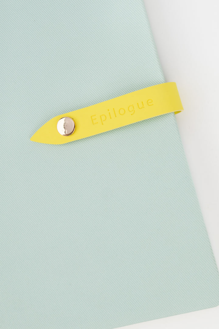 Yellow strap with 'Epilogue' branding on a light green background