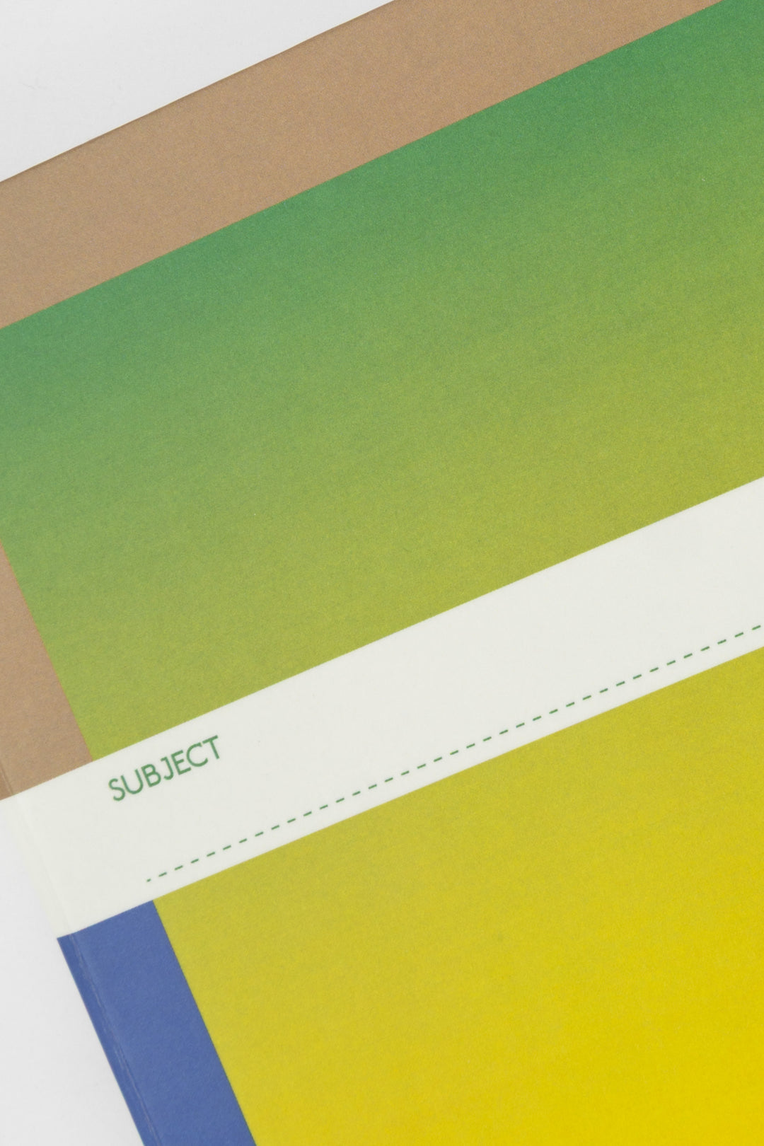 close up of blue to yellow gradient notebook cover with subject line
