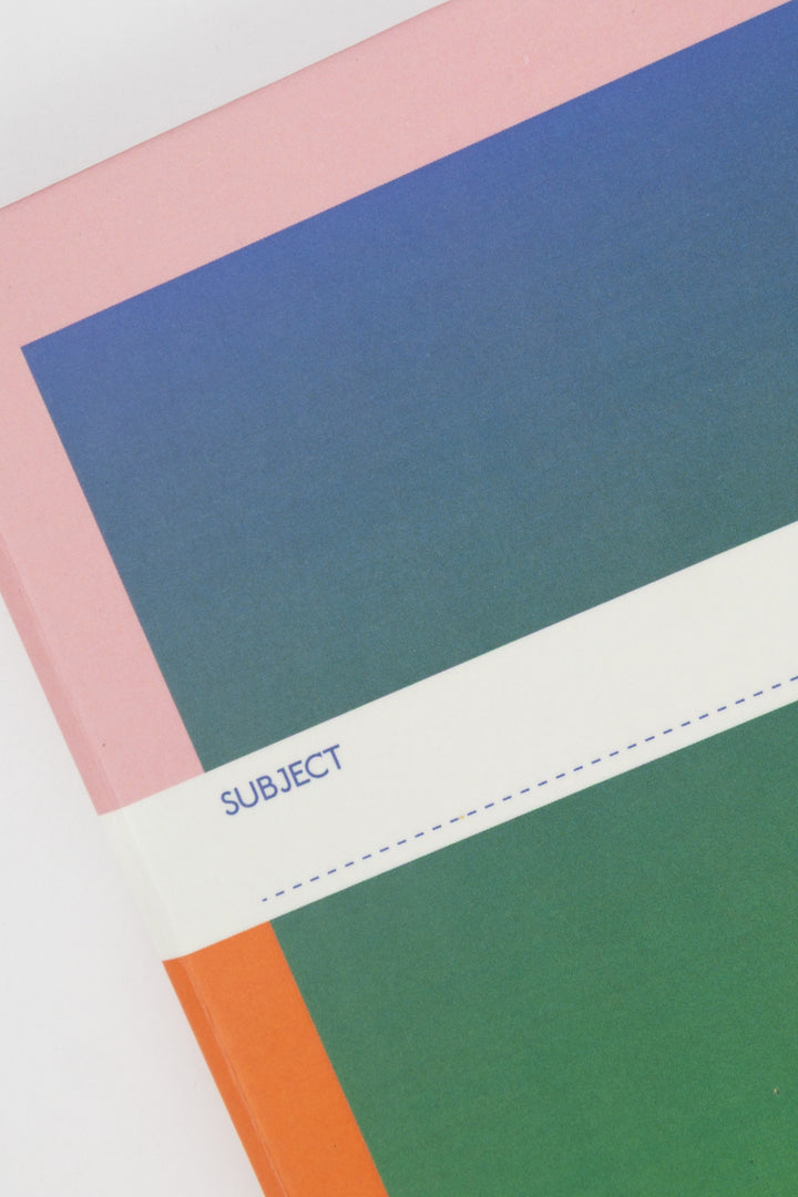 close-up of gradient cover showing pink and blue border and subject label
