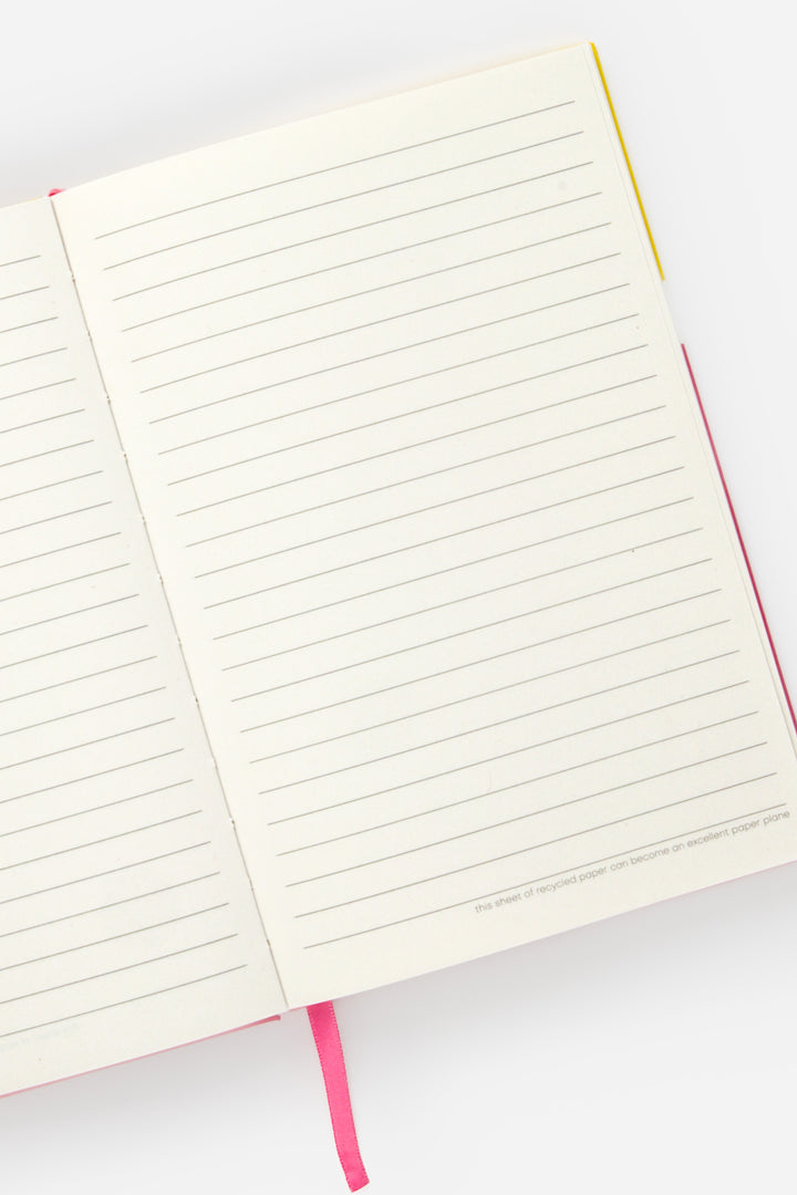open A5 notebook with lined pages and pink page marker
