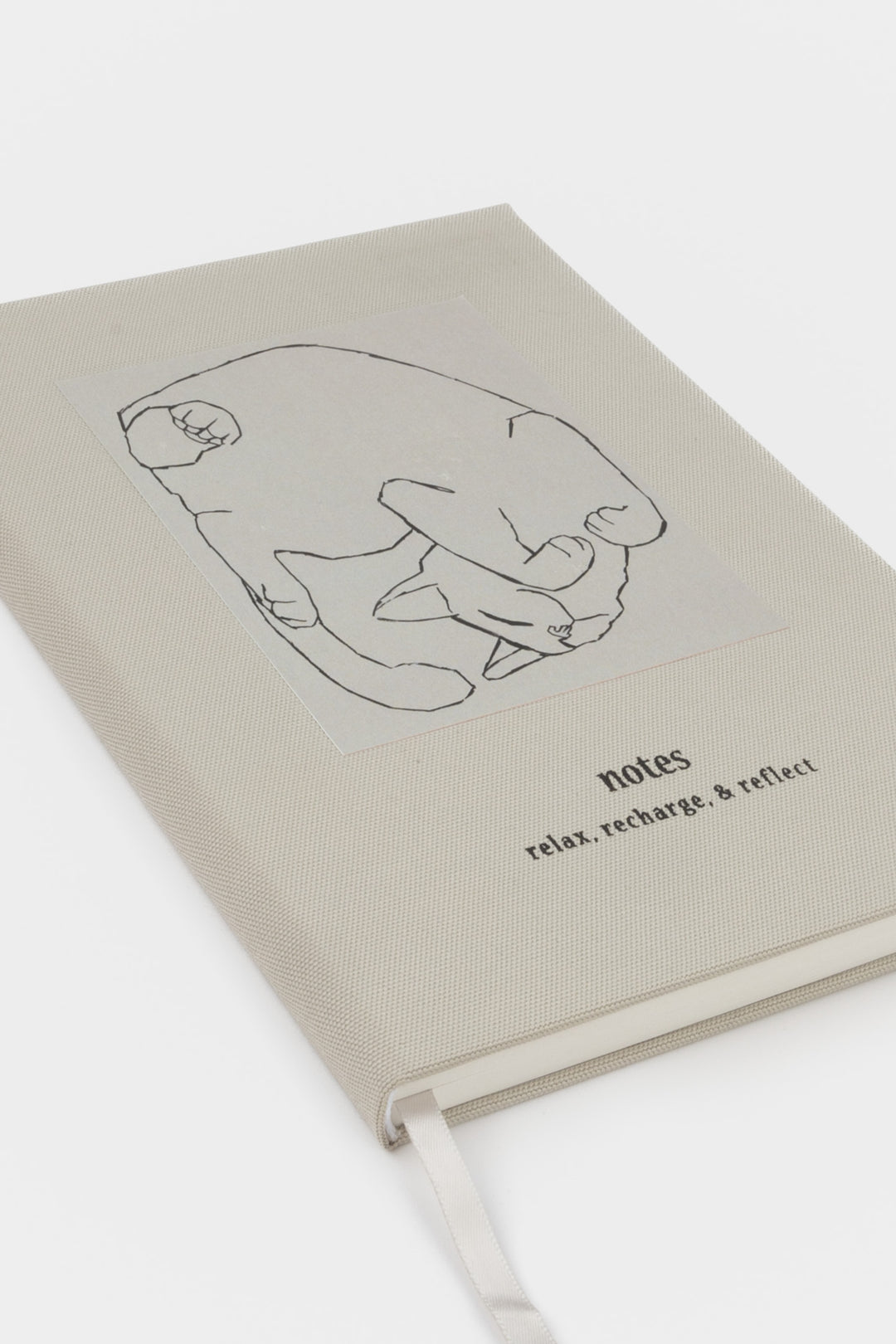 Grey relax recharge and reflect notebook with a cat illustration 