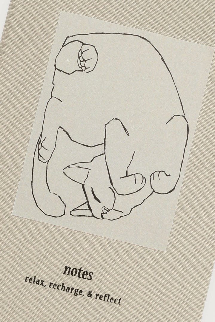 Grey relax recharge and reflect notebook with a cat illustration 