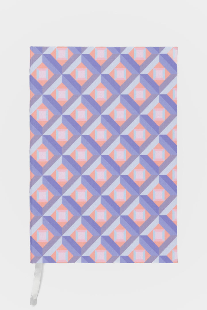 A5 hardcover notebook with optical print shown flat with ribbon marker visible
