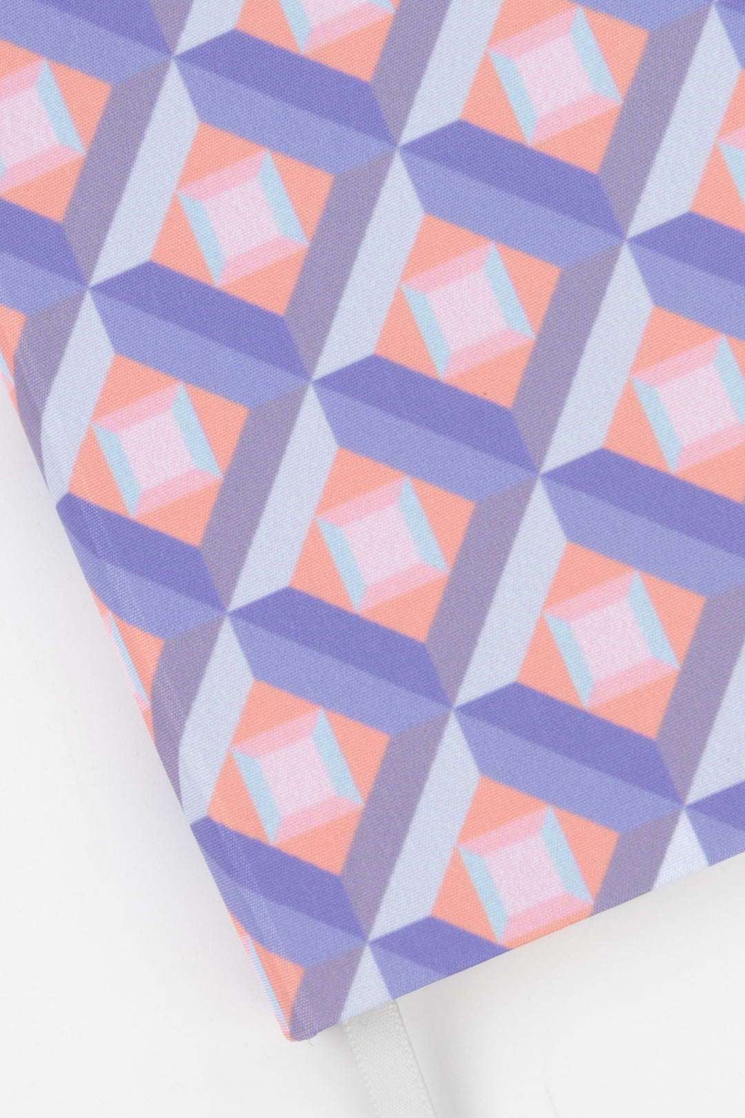 Close-up of the pink and purple optical geometric print on the A5 hardcover notebook
