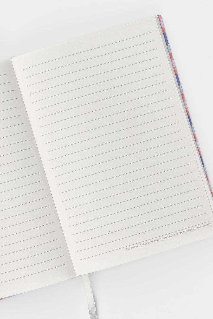 Open A5 notebook with ruled recycled paper pages and ribbon marker visible