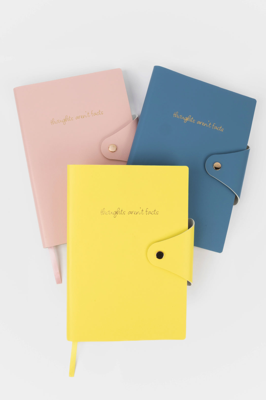 Three colorful notebooks (pink, yellow, blue) with 'hello my love' text on a white background