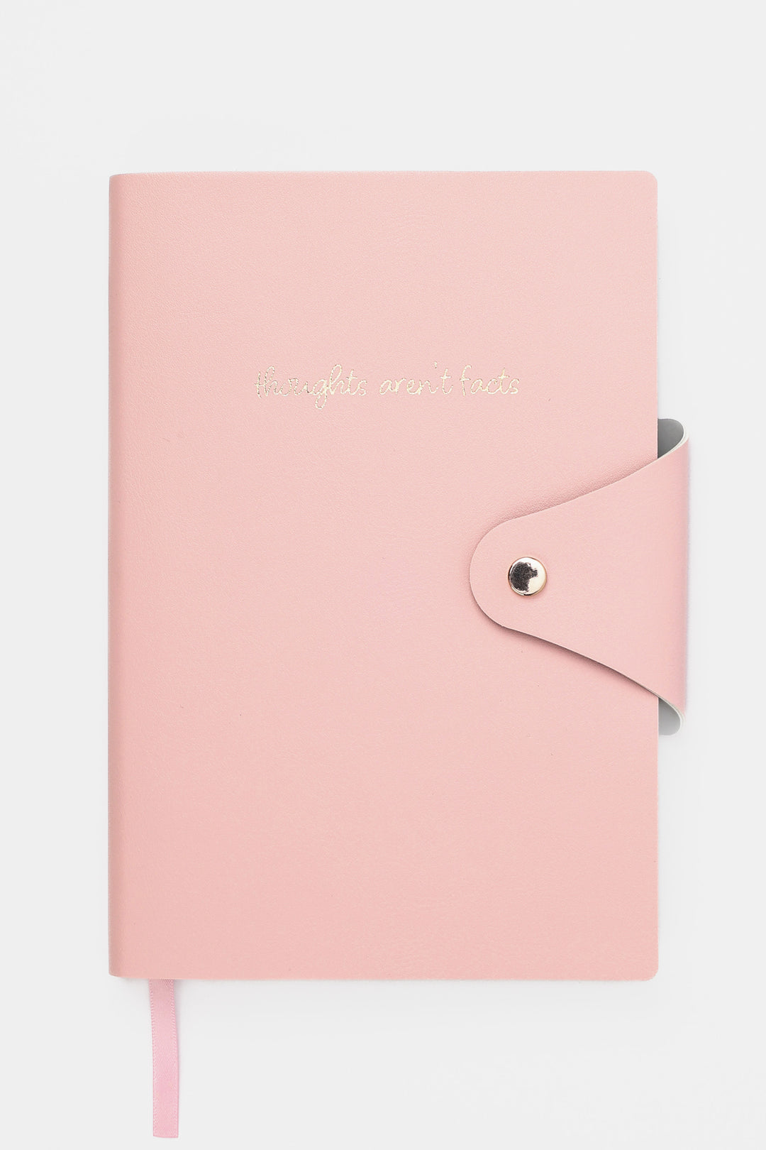 Pink notebook with a gold clasp on a white background