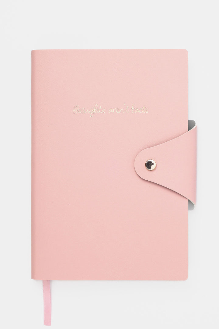 Pink notebook with a gold clasp on a white background