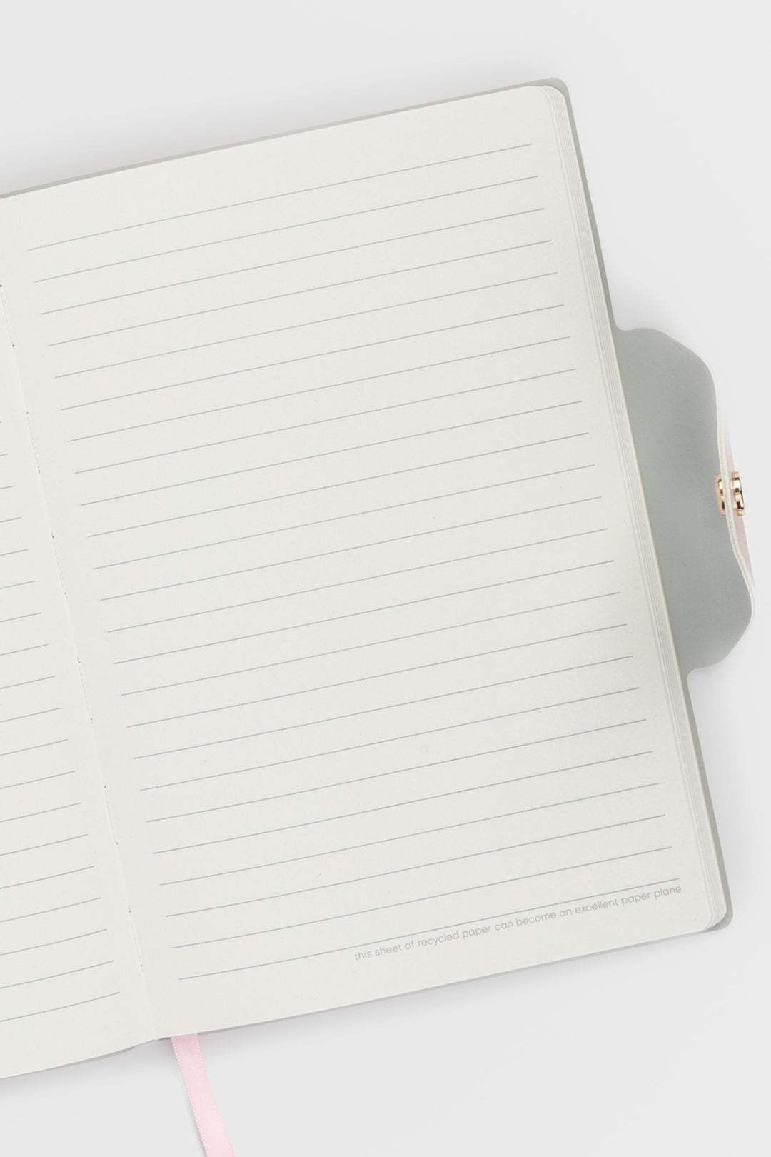 Notebook with lined pages on a white background