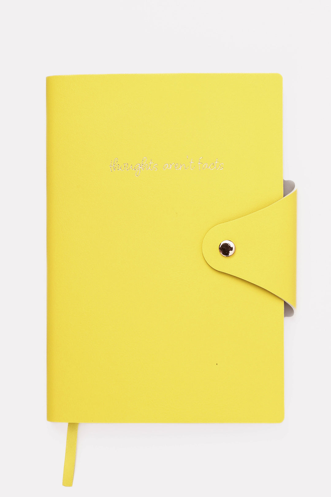 Yellow notebook with a strap on a white background