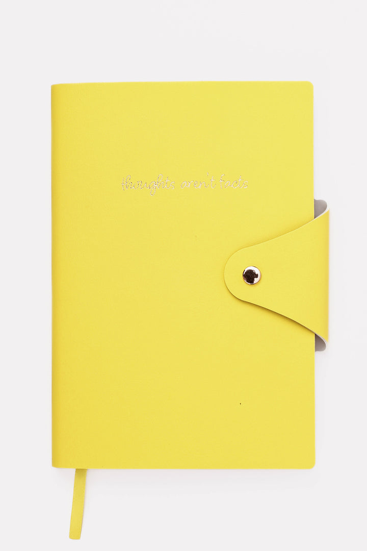 Yellow notebook with a strap on a white background