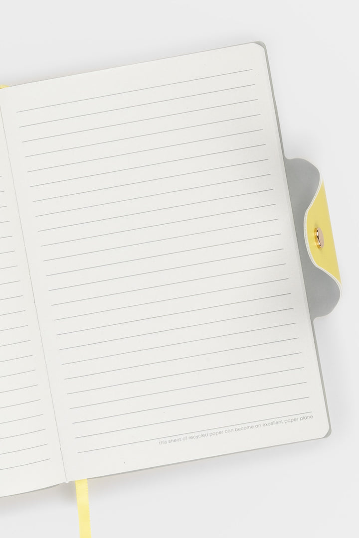 Notebook with lined pages on a white background