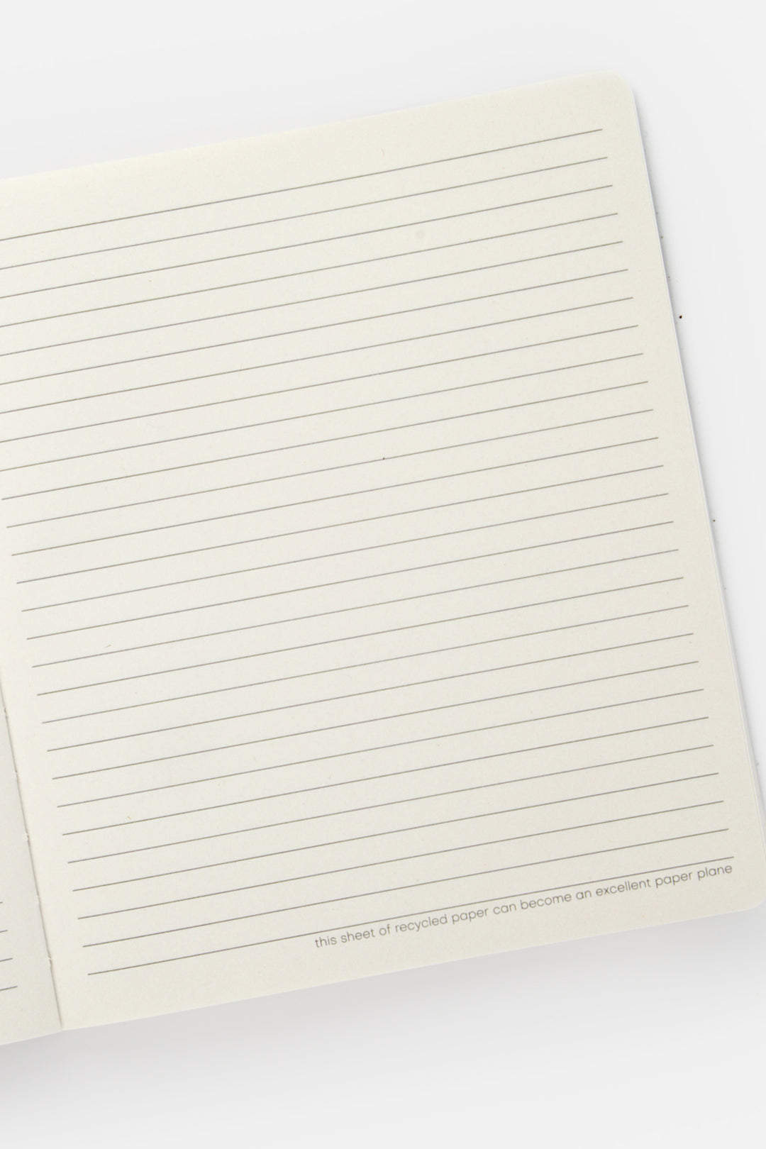Open notebook with lined pages on a white background