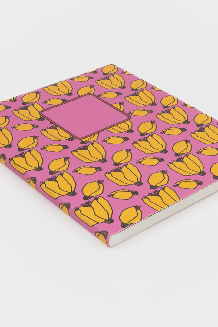 Notebook with banana pattern on a pink cover