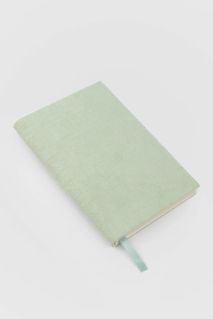 green faux suede  flex-cover diary with embossed pattern 
