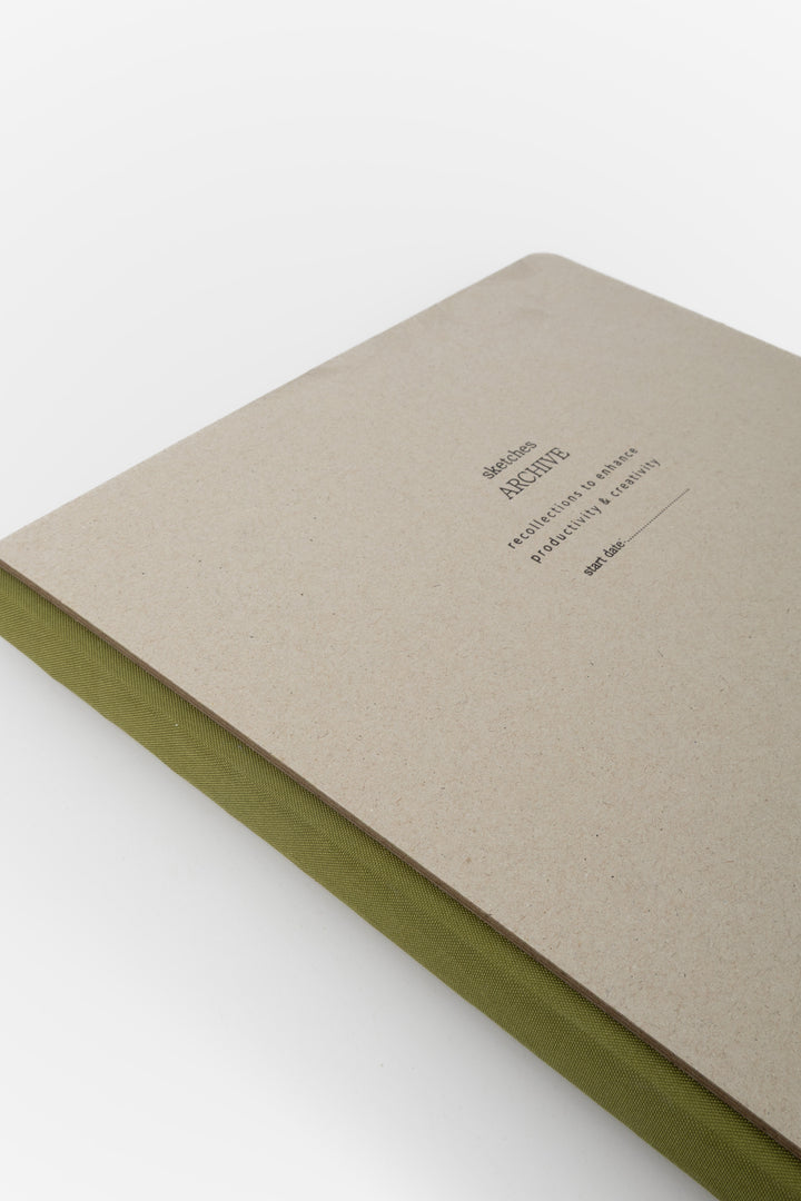 Beige sketchbook with Archive text and fabric spine