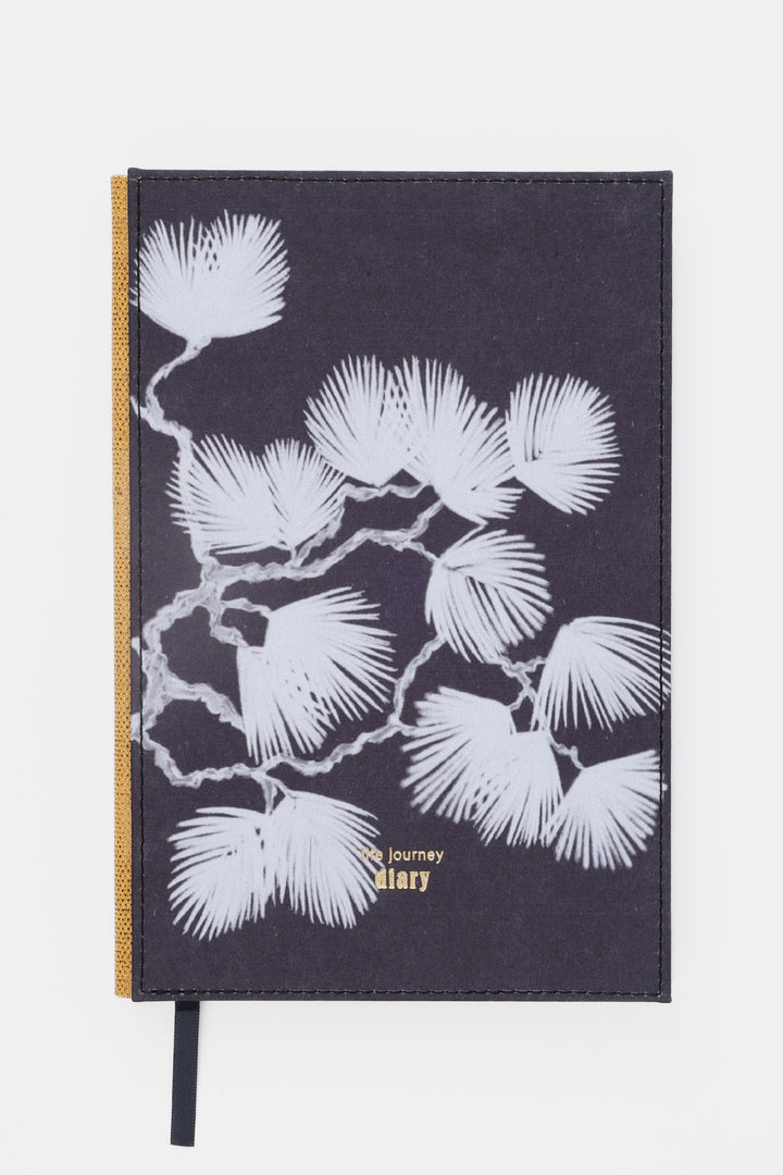 A5 diary with dark fabric cover featuring white botanical illustration front view with ribbon bookmark