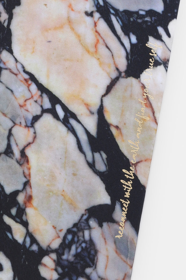 Close up of A5 diary fabric cover showing natural stone print detail with gold foil text