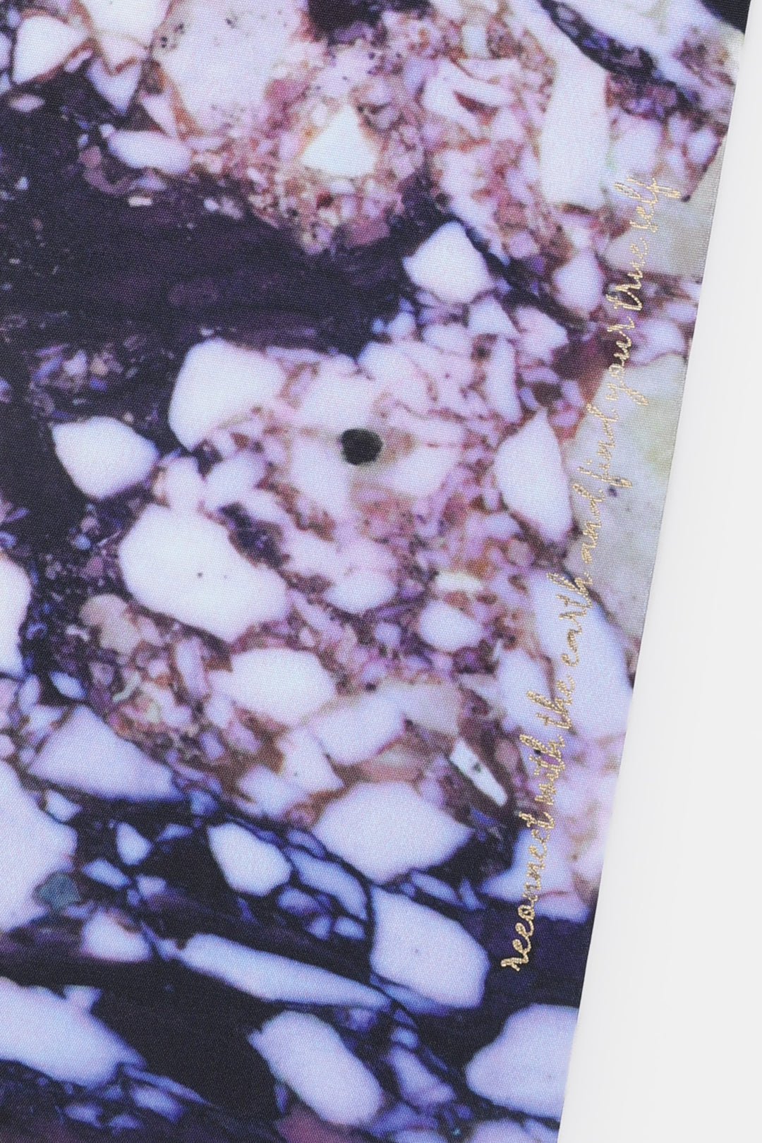 Close up of A5 diary fabric cover showing natural stone print detail with gold foil text