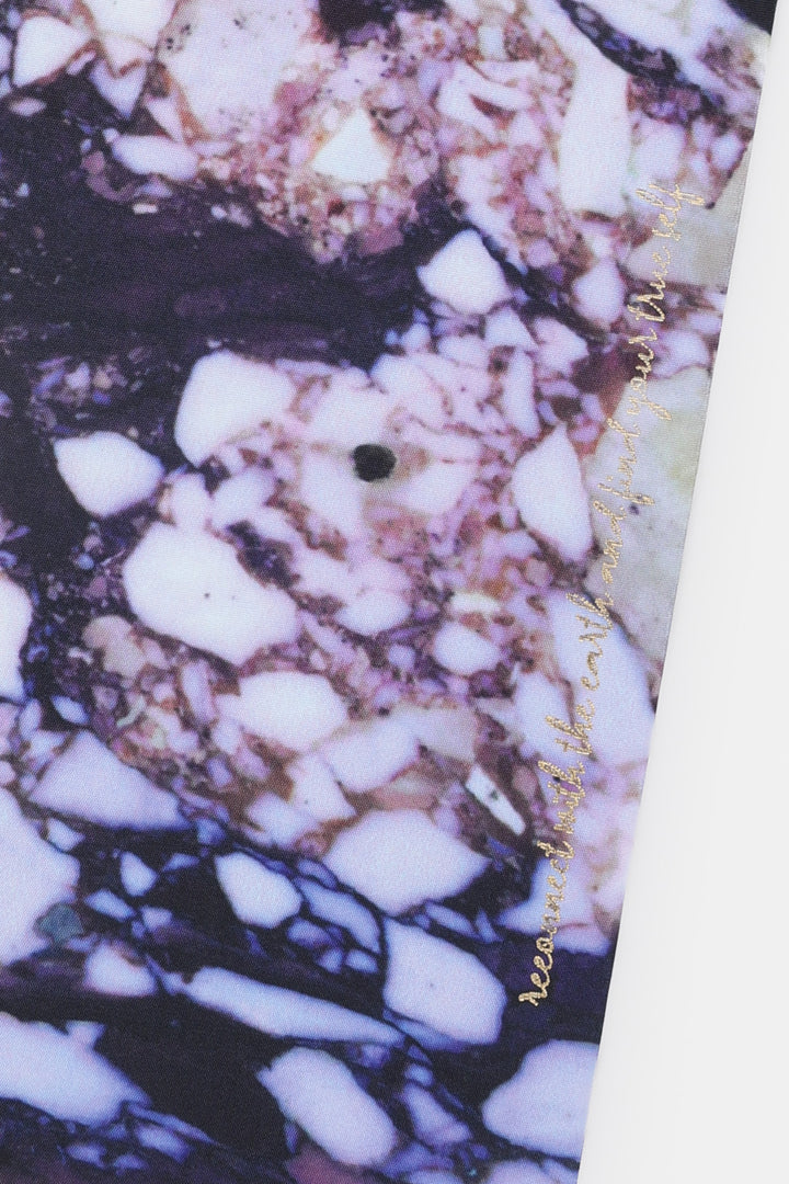 Close up of A5 diary fabric cover showing natural stone print detail with gold foil text