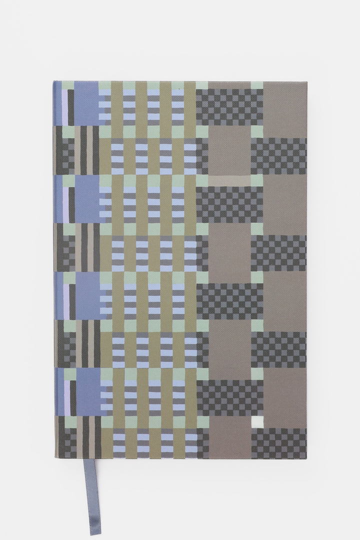 A5 journal with blue and grey geometric cover closed front view with ribbon bookmark