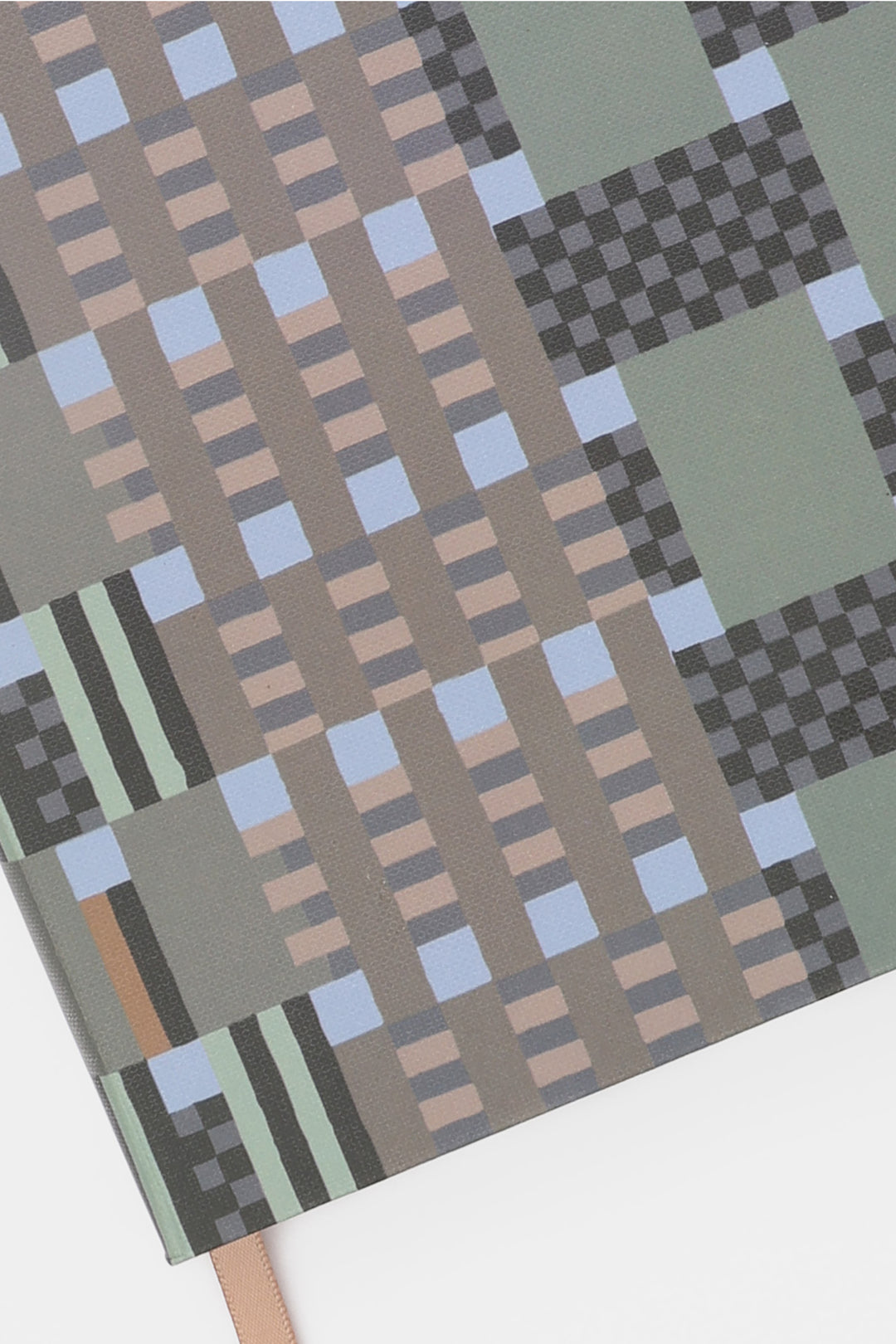 A5 journal cover detail showing green grey and green geometric pattern paper texture