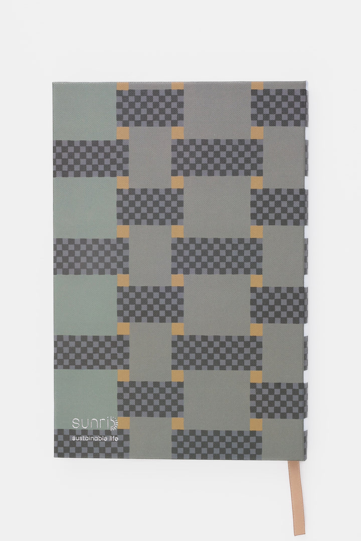 Back view of A5 journal with green and grey geometric paper cover and ribbon bookmark