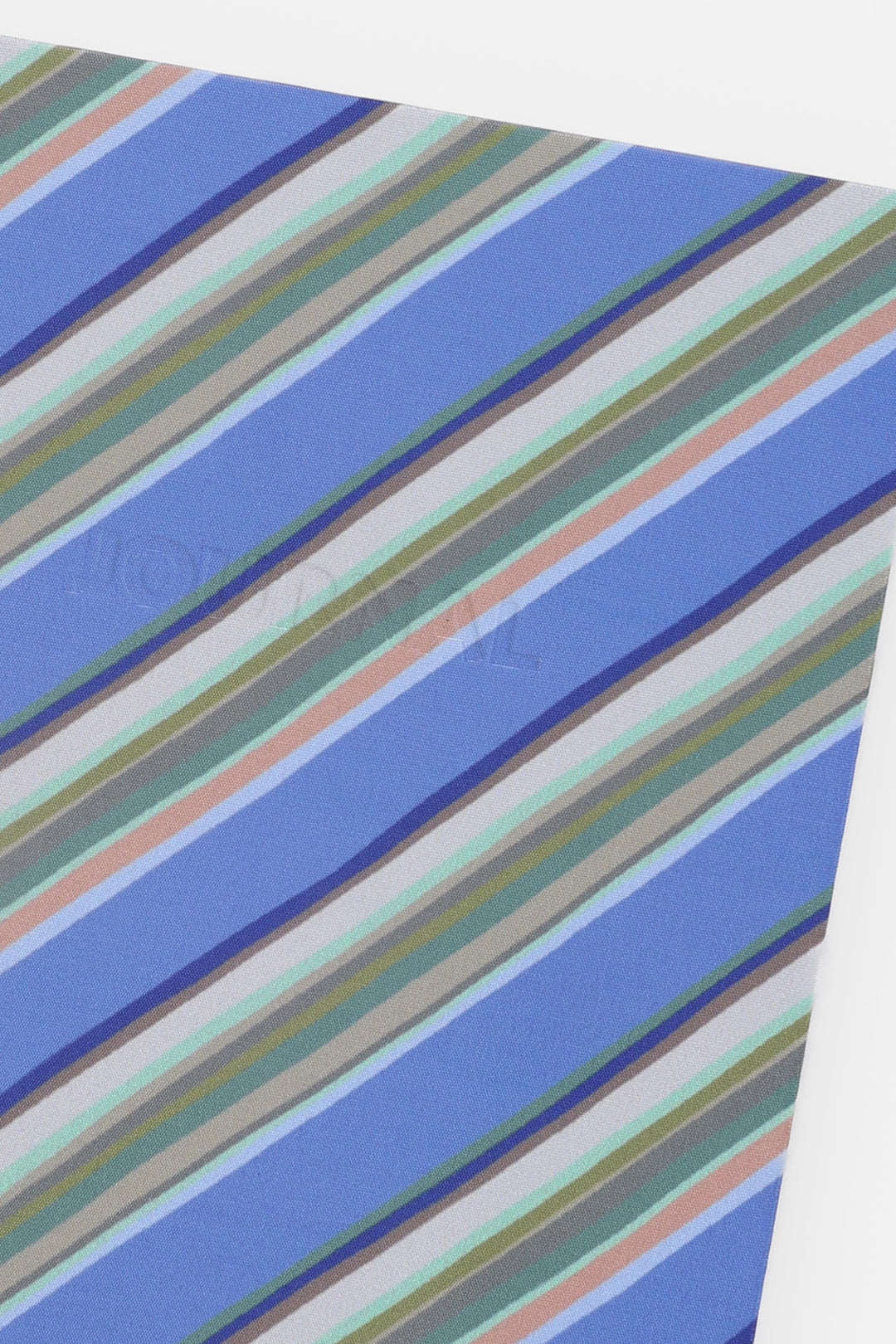 Close-up of a fabric with blue, green, and beige striped pattern