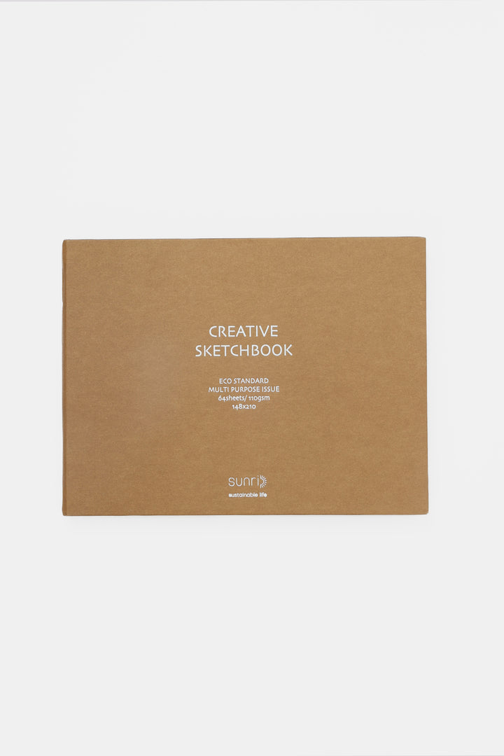 Brown sketchbook with 'Creative Sketchbook' text on a white background