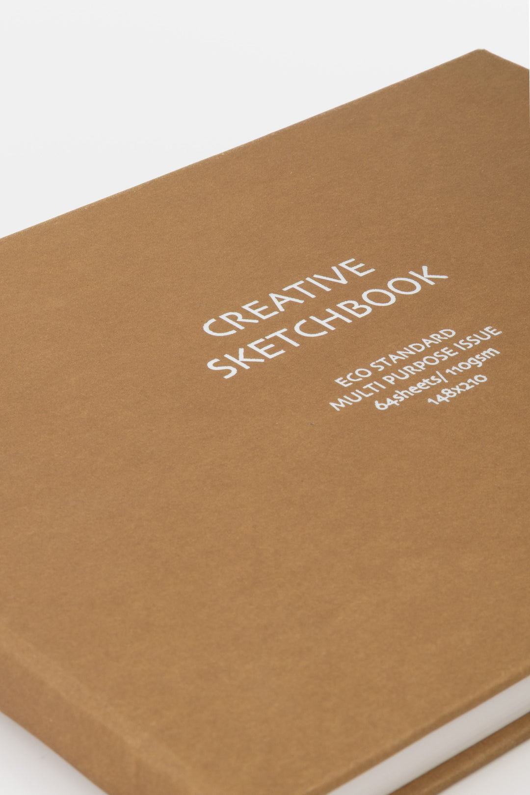 Brown sketchbook with 'Creative Sketchbook' text on a white background