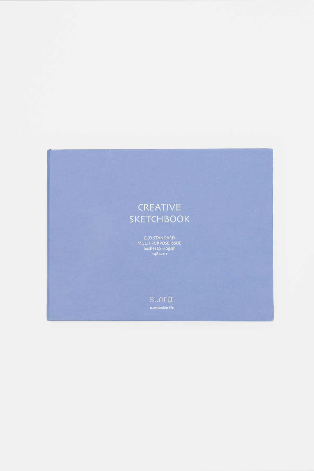 purple landscape sketchbook closed with white title on the cover