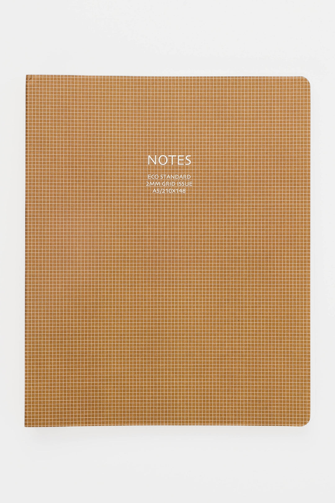 Brown notebook with grid pattern and 'NOTES' text on a white background