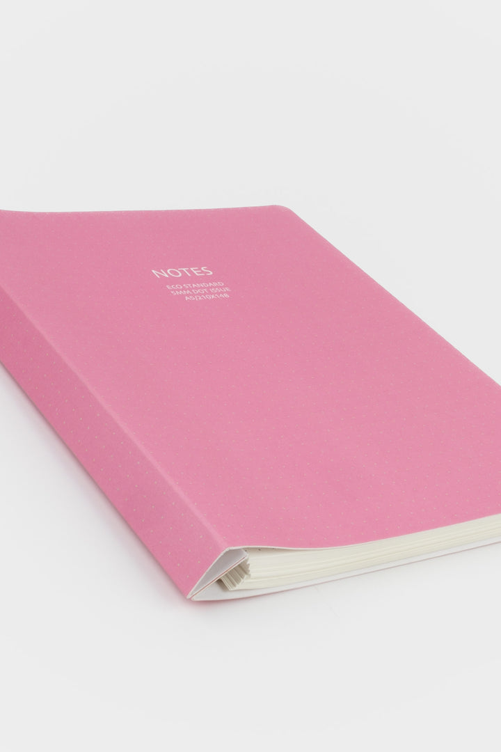 Pink notebook with 'NOTES' text on a white background